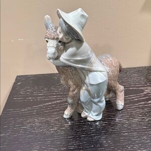 Porcelain Figurine of Child with Llama